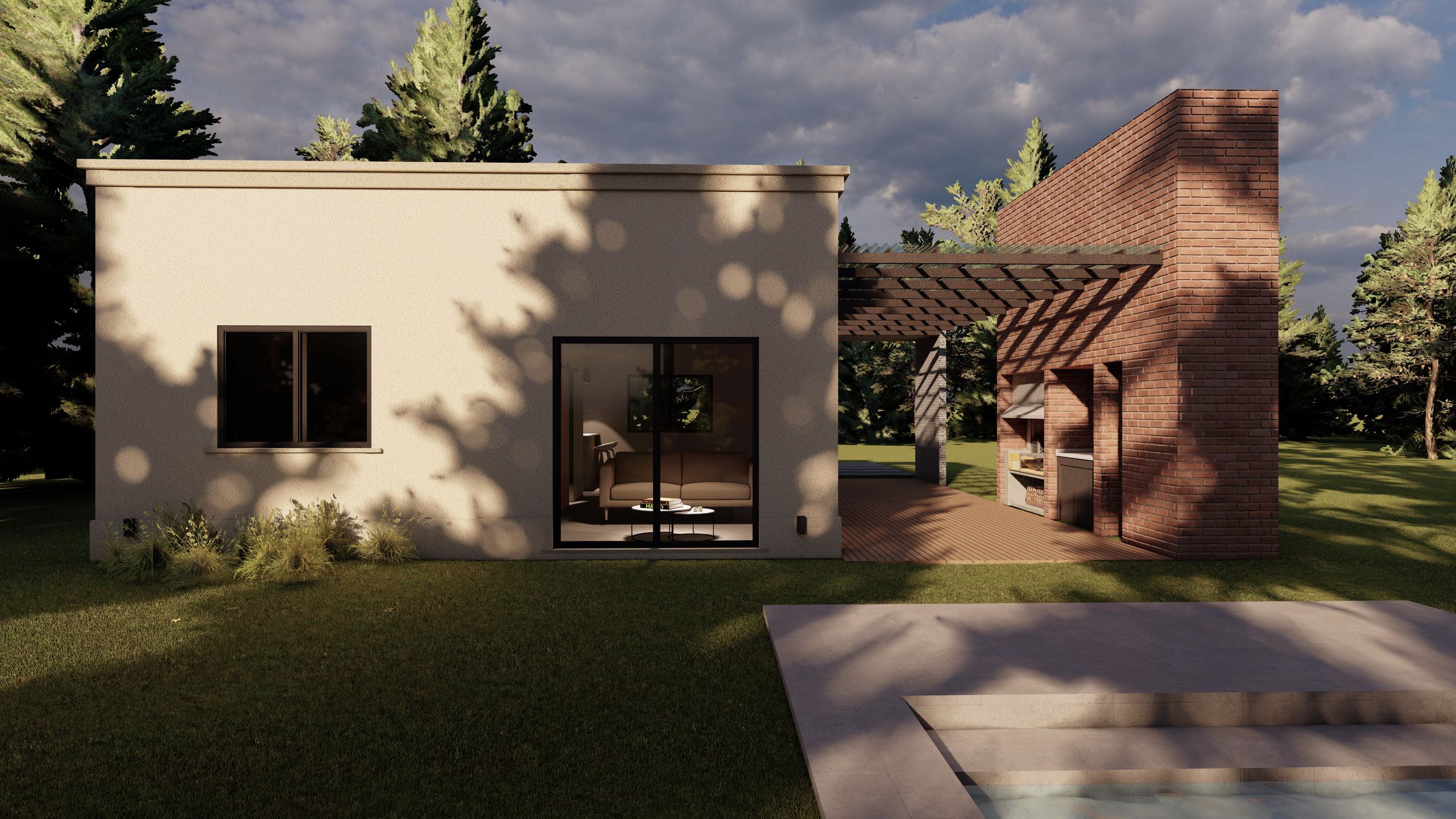 Rear façade of Casa J1 in afternoon light: a white volume with tree shadows, a brick gallery under a pergola and the edge of the pool in the foreground.